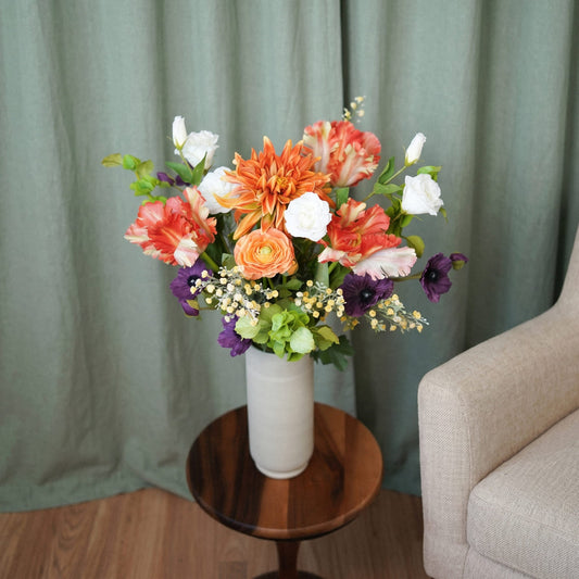 Bouquet de fleurs artificielles Honorine tons orange et violet Flowrette